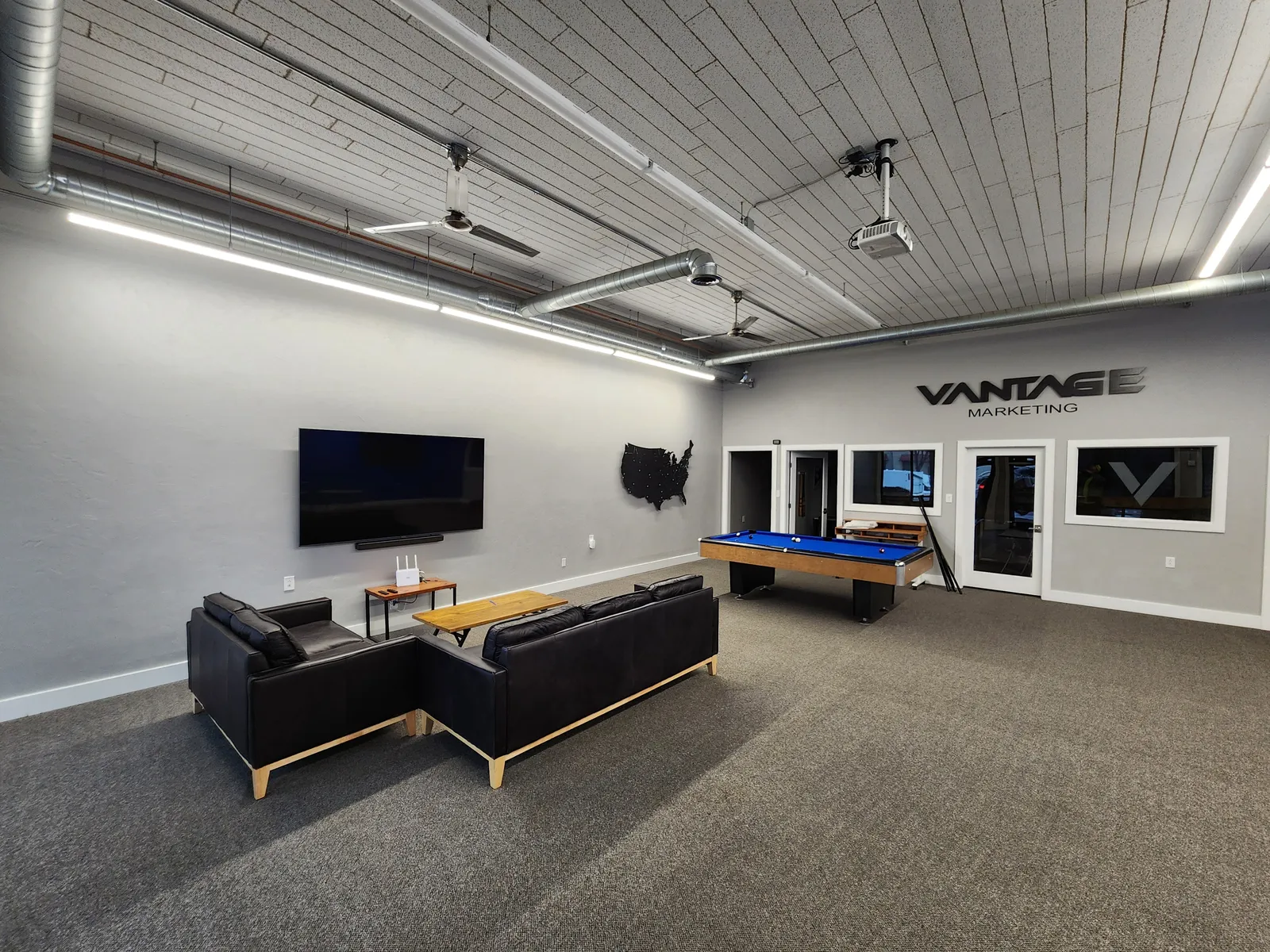 Finished game room lounge area